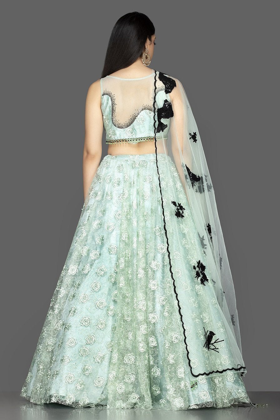 Shop beautiful mint green stone and embroidery net lehenga online in USA with net dupatta. Look radiant on weddings and special occasions in splendid designer lehengas crafted with finest embroideries and stunning silhouettes from Pure Elegance Indian fashion boutique in USA.-back