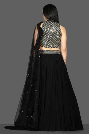 Shop beautiful black embroidered net lehenga online in USA with dupatta. Flaunt ethnic fashion with exquisite designer lehenga, Indian wedding dresses from Pure Elegance Indian fashion boutique in USA.-back