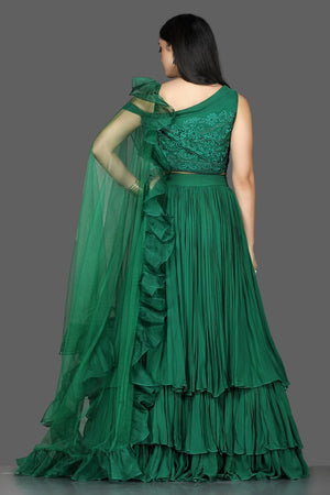 Buy stylish bottle green georgette layered lehenga online in USA with ruffle dupatta. Flaunt ethnic fashion with exquisite designer lehenga, Indian wedding dresses from Pure Elegance Indian fashion boutique in USA.-back