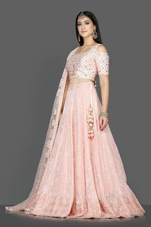 Buy gorgeous powder pink embroidered georgette lehenga online in USA with dupatta. Go for an attractive wedding style with Pure Elegance designer lehengas. traditional salwar suits, Indowestern dresses available at our exclusive Indian fashion store in USA.-side
