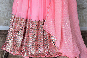 Shop beautiful light pink mirror work net and georgette lehenga online in USA. Be occasion ready in stunning designer dresses, lehengas, palazzo suits, sharara suits, bridal lehengas from Pure Elegance Indian clothing store in USA.-skirt