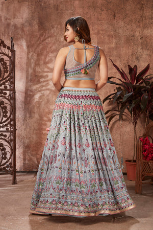 Buy beautiful light grey mirror work georgette lehenga online in USA with dupatta. Dazzle at weddings and parties in exquisite Indian designerwear dresses, designer lehengas, Anarkali suits, gowns, palazzo suits, sharara suits from Pure Elegance Indian fashion store in USA.-back