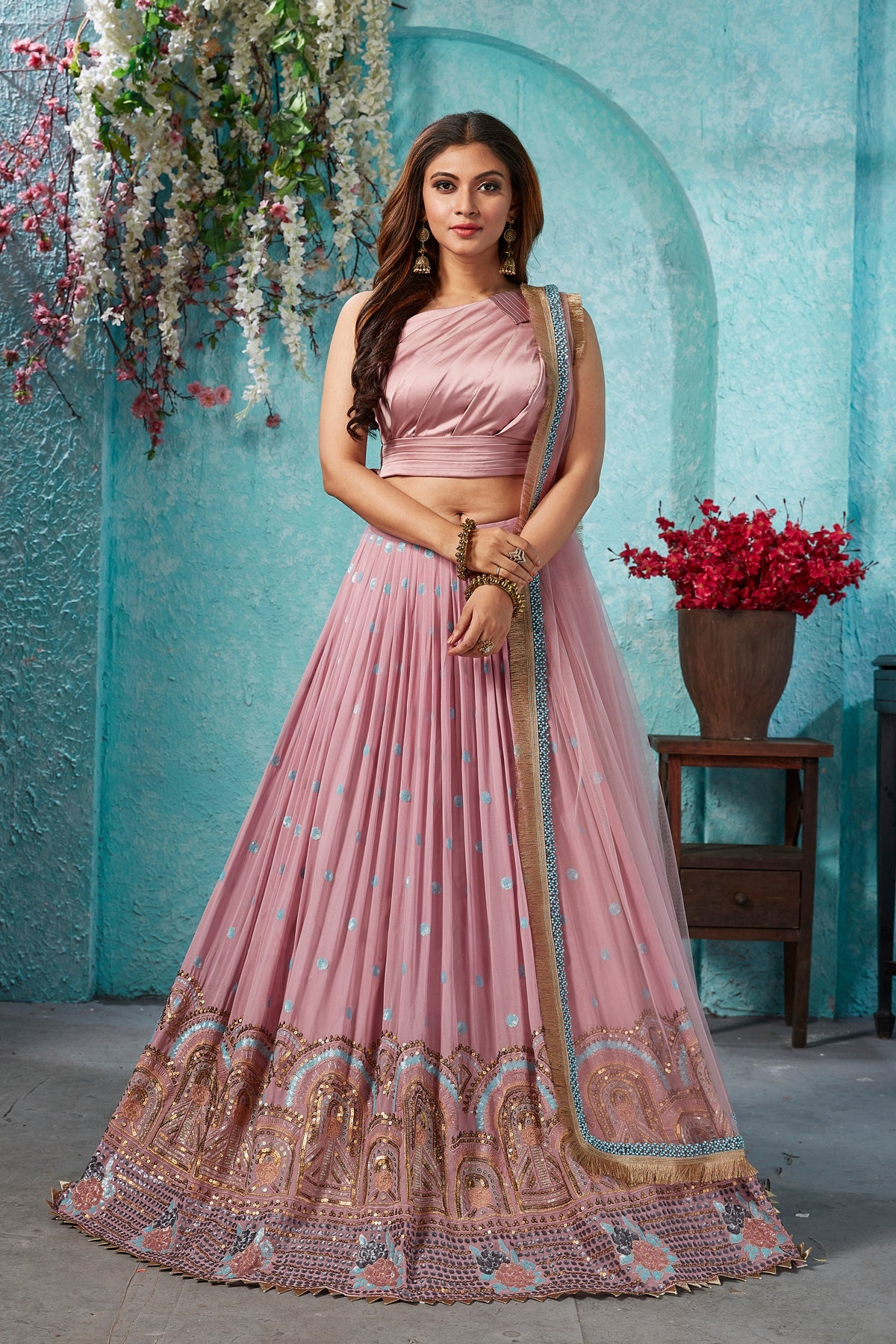 Buy stunning onion pink embroidered georgette lehenga online in USA with dupatta. Dazzle at weddings and parties in exquisite Indian designerwear dresses, designer lehengas, Anarkali suits, gowns, palazzo suits, sharara suits from Pure Elegance Indian fashion store in USA.-full view