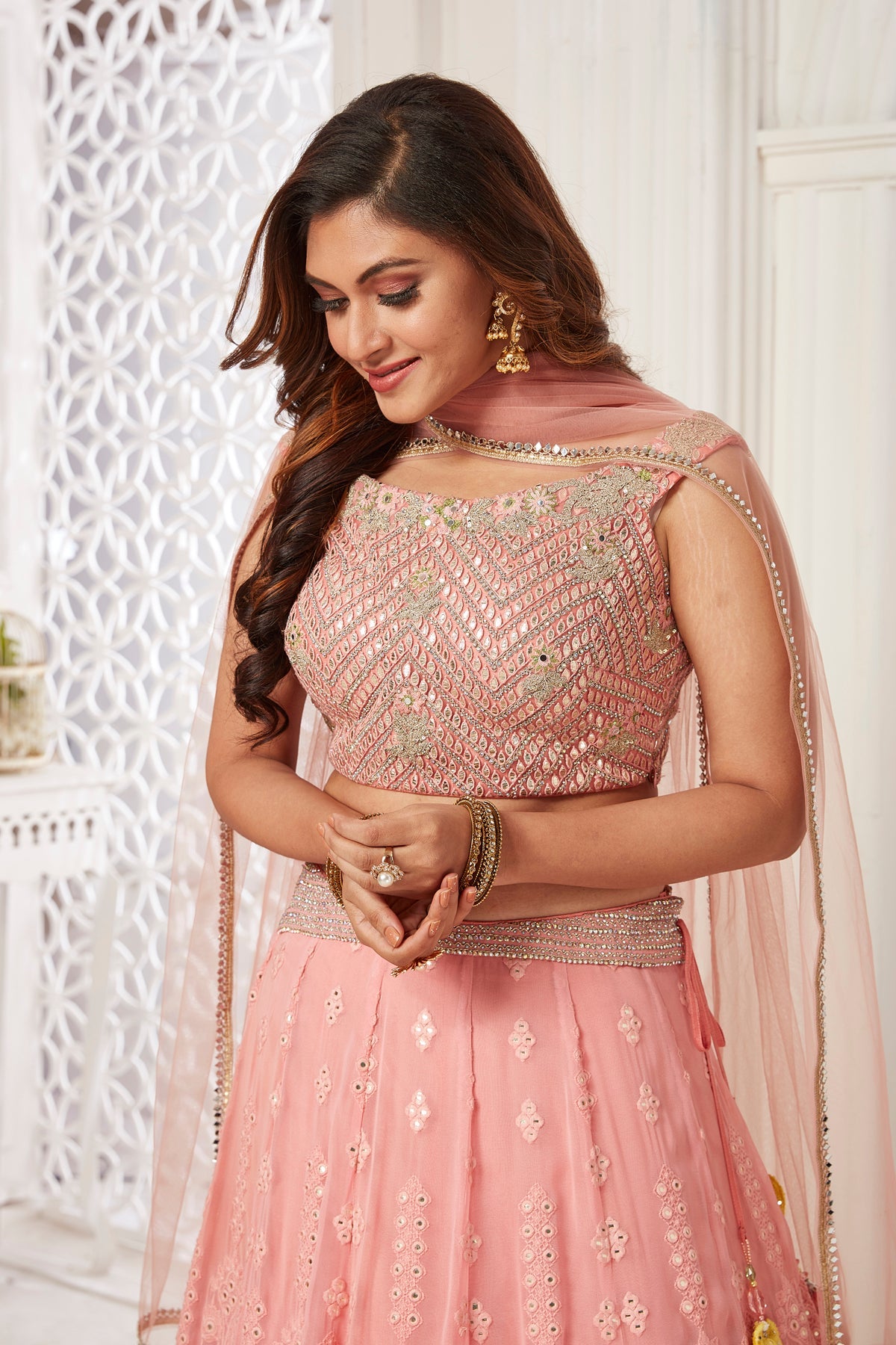 Buy beautiful powder pink and yellow embroidered lehenga online in USA with dupatta. Dazzle at weddings and parties in exquisite Indian designerwear dresses, designer lehengas, Anarkali suits, gowns, palazzo suits, sharara suits from Pure Elegance Indian fashion store in USA.-closeup