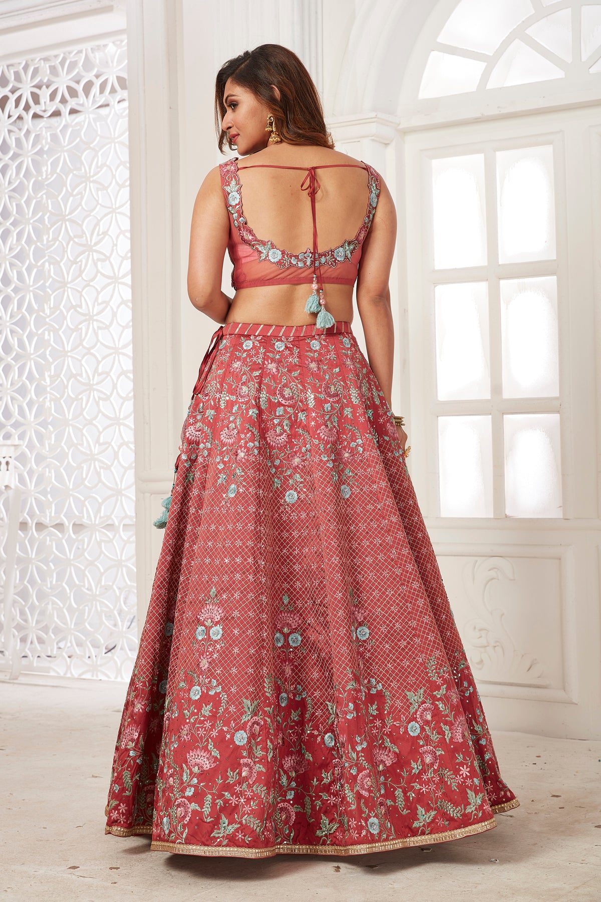 Shop gorgeous rose pink embroidered lehenga online in USA with dupatta. Dazzle at weddings and parties in exquisite Indian designerwear dresses, designer lehengas, Anarkali suits, gowns, palazzo suits, sharara suits from Pure Elegance Indian fashion store in USA.-back