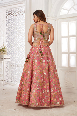 Buy stunning pink embroidered net lehenga online in USA with dupatta. Dazzle at weddings and parties in exquisite Indian designerwear dresses, designer lehengas, Anarkali suits, gowns, palazzo suits, sharara suits from Pure Elegance Indian fashion store in USA.-back