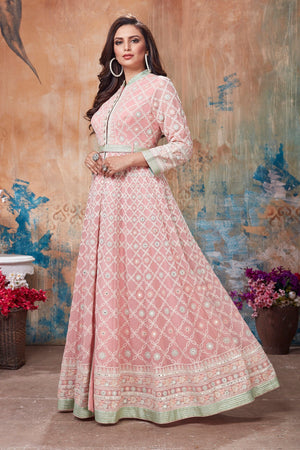 Buy gorgeous light pink embroidered floorlength Anarkali suit online in USA. Get set for weddings and festive occasions in exclusive designer Anarkali suits, wedding gown, salwar suits, gharara suits, Indowestern dresses from Pure Elegance Indian fashion store in USA.-left