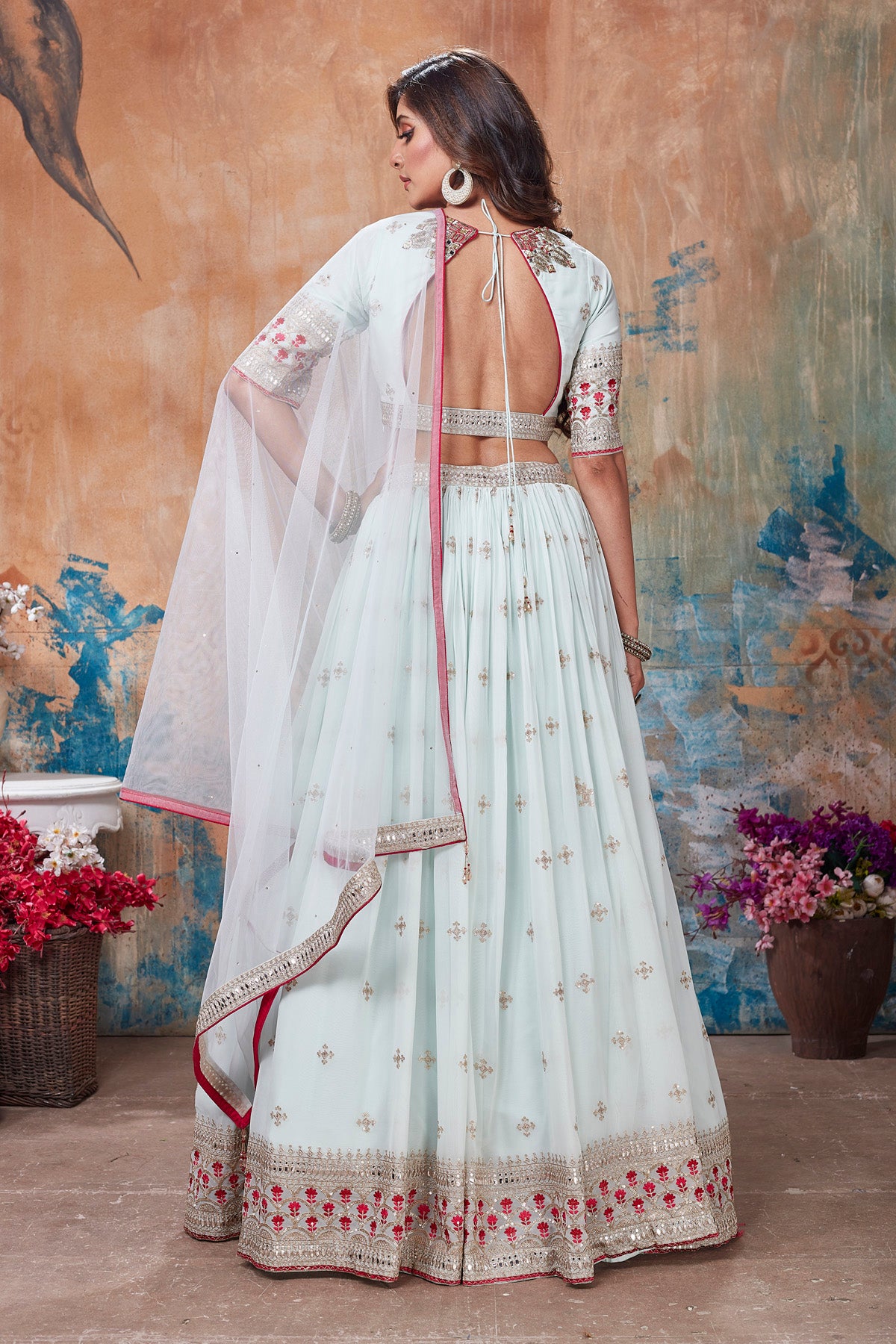 Shop stunning white embroidered lehenga online in USA with dupatta. Get set for weddings and festive occasions in exclusive designer Anarkali suits, wedding gown, salwar suits, gharara suits, Indowestern dresses from Pure Elegance Indian fashion store in USA.-back