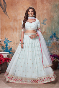 Shop stunning white embroidered lehenga online in USA with dupatta. Get set for weddings and festive occasions in exclusive designer Anarkali suits, wedding gown, salwar suits, gharara suits, Indowestern dresses from Pure Elegance Indian fashion store in USA.-full view