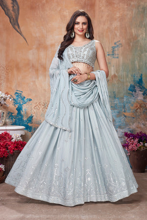 Buy gorgeous light grey embroidered designer lehenga online in USA with dupatta. Get set for weddings and festive occasions in exclusive designer Anarkali suits, wedding gown, salwar suits, gharara suits, Indowestern dresses from Pure Elegance Indian fashion store in USA.-front