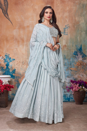 Buy gorgeous light grey embroidered designer lehenga online in USA with dupatta. Get set for weddings and festive occasions in exclusive designer Anarkali suits, wedding gown, salwar suits, gharara suits, Indowestern dresses from Pure Elegance Indian fashion store in USA.-right