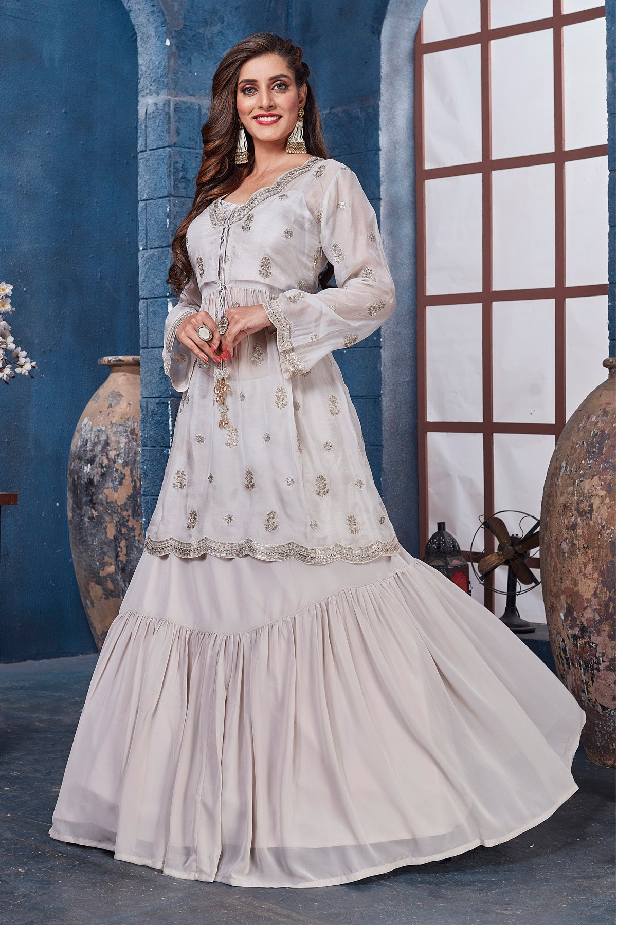 Shop beautiful white embroidered kurta online in USA with skirt and dupatta. Get set for weddings and festive occasions in exclusive designer Anarkali suits, wedding gown, salwar suits, gharara suits, Indowestern dresses from Pure Elegance Indian fashion store in USA.-left