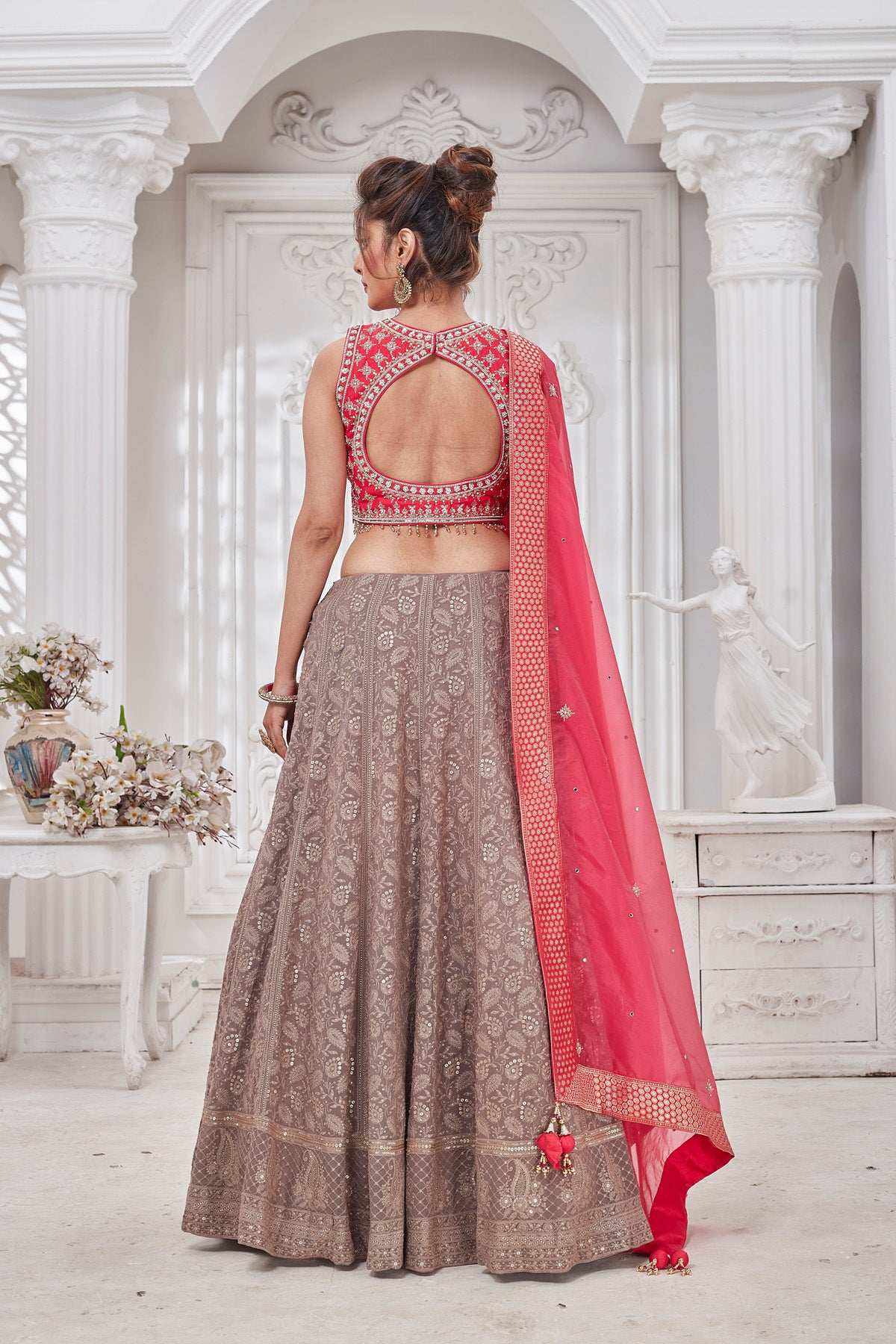 Buy gorgeous pink and beige embroidered lehenga online in USA with dupatta. Get set for weddings and festive occasions in exclusive designer Anarkali suits, wedding gown, salwar suits, gharara suits, Indowestern dresses from Pure Elegance Indian fashion store in USA.-back