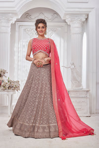 Buy gorgeous pink and beige embroidered lehenga online in USA with dupatta. Get set for weddings and festive occasions in exclusive designer Anarkali suits, wedding gown, salwar suits, gharara suits, Indowestern dresses from Pure Elegance Indian fashion store in USA.-full view