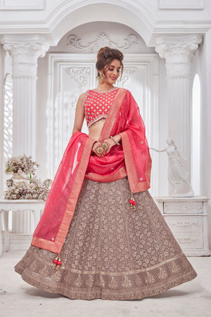 Buy gorgeous pink and beige embroidered lehenga online in USA with dupatta. Get set for weddings and festive occasions in exclusive designer Anarkali suits, wedding gown, salwar suits, gharara suits, Indowestern dresses from Pure Elegance Indian fashion store in USA.-front