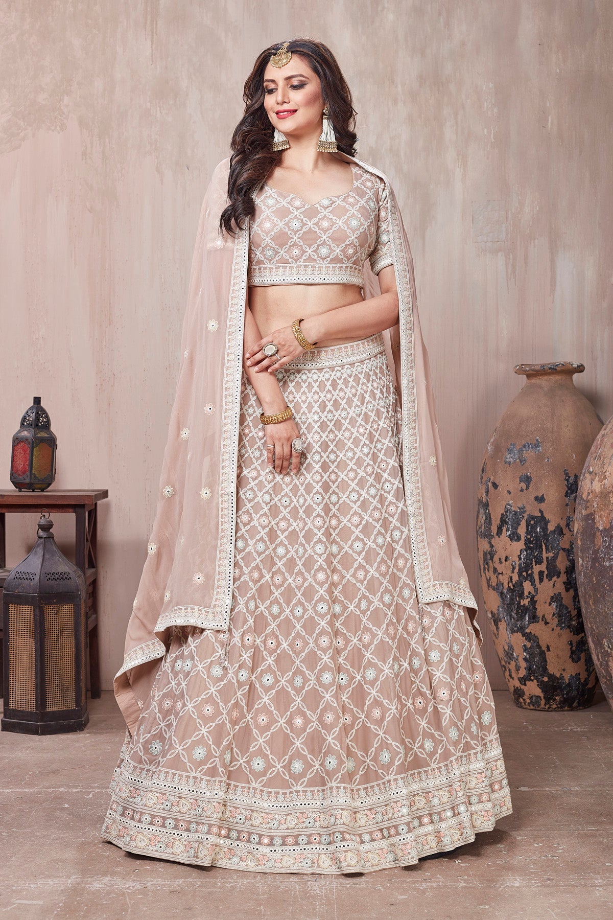 Buy beautiful beige embroidered designer lehenga online in USA with dupatta. Get set for weddings and festive occasions in exclusive designer Anarkali suits, wedding gown, salwar suits, gharara suits, Indowestern dresses from Pure Elegance Indian fashion store in USA.-full view
