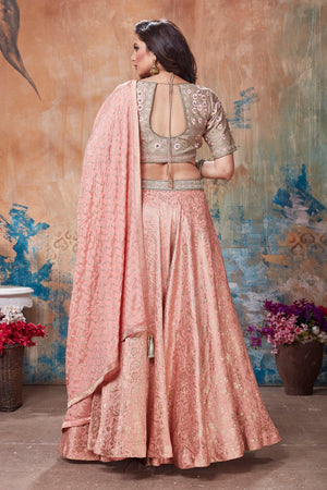 Buy stunning peach and beige embroidered designer lehenga online in USA with dupatta. Get set for weddings and festive occasions in exclusive designer Anarkali suits, wedding gown, salwar suits, gharara suits, Indowestern dresses from Pure Elegance Indian fashion store in USA.-back