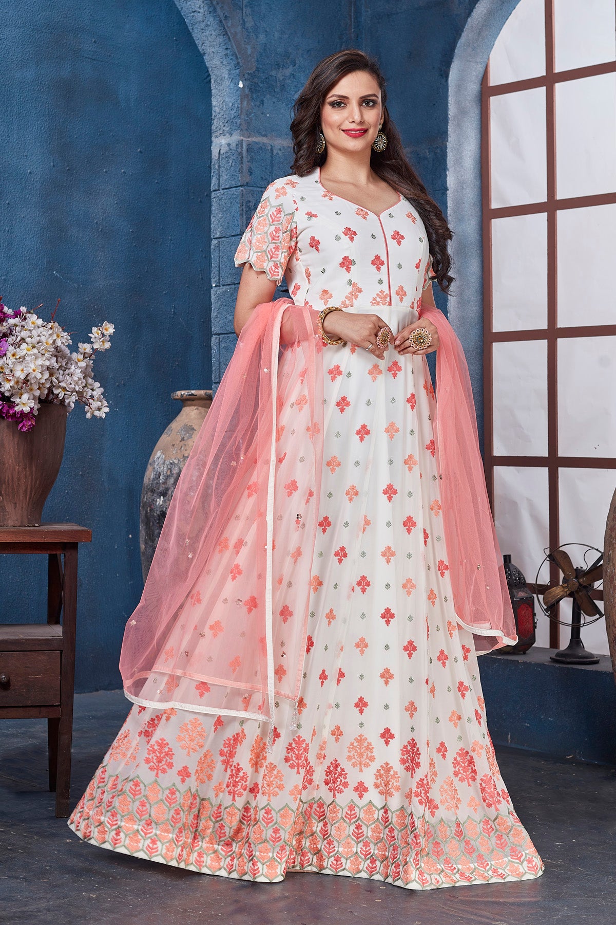 Buy gorgeous white embroidered floorlength Anarkali online in USA with dupatta. Get set for weddings and festive occasions in exclusive designer Anarkali suits, wedding gown, salwar suits, gharara suits, Indowestern dresses from Pure Elegance Indian fashion store in USA.-front