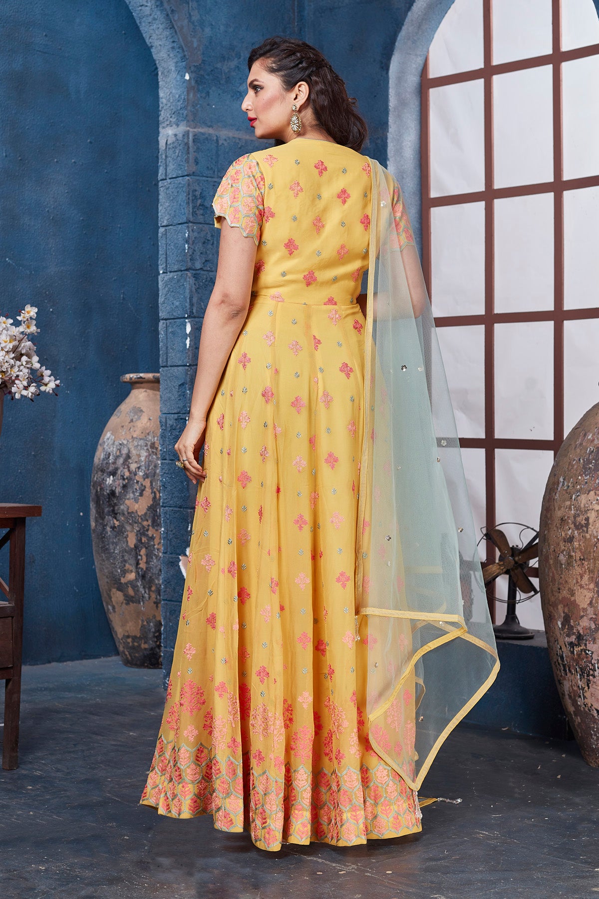 Buy gorgeous yellow embroidered floorlength Anarkali online in USA with dupatta. Get set for weddings and festive occasions in exclusive designer Anarkali suits, wedding gown, salwar suits, gharara suits, Indowestern dresses from Pure Elegance Indian fashion store in USA.-back