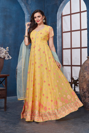 Buy gorgeous yellow embroidered floorlength Anarkali online in USA with dupatta. Get set for weddings and festive occasions in exclusive designer Anarkali suits, wedding gown, salwar suits, gharara suits, Indowestern dresses from Pure Elegance Indian fashion store in USA.-left