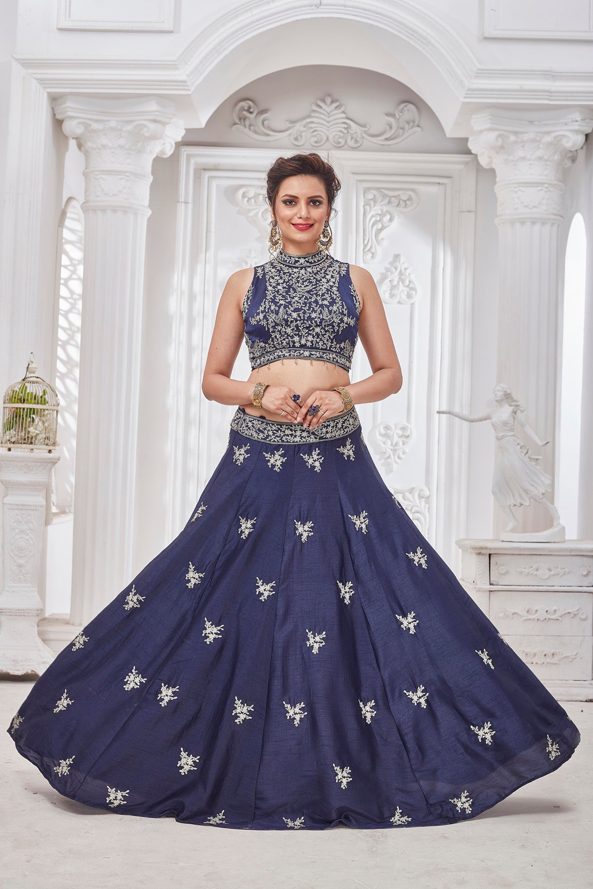 Shop gorgeous blue embroidered designer lehenga online in USA with ruffle dupatta. Get set for weddings and festive occasions in exclusive designer Anarkali suits, wedding gown, salwar suits, gharara suits, Indowestern dresses from Pure Elegance Indian fashion store in USA.-front