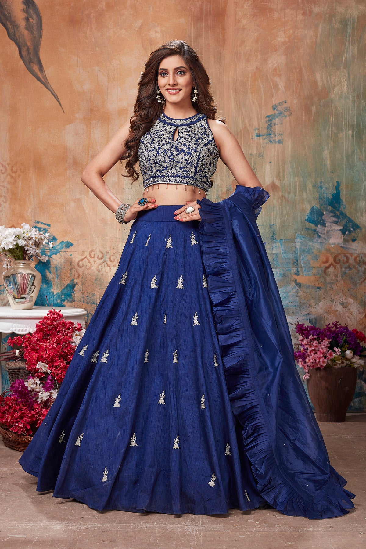 Buy gorgeous blue designer lehenga online in USA with ruffle dupatta. Get set for weddings and festive occasions in exclusive designer Anarkali suits, wedding gown, salwar suits, gharara suits, Indowestern dresses from Pure Elegance Indian fashion store in USA.-full view