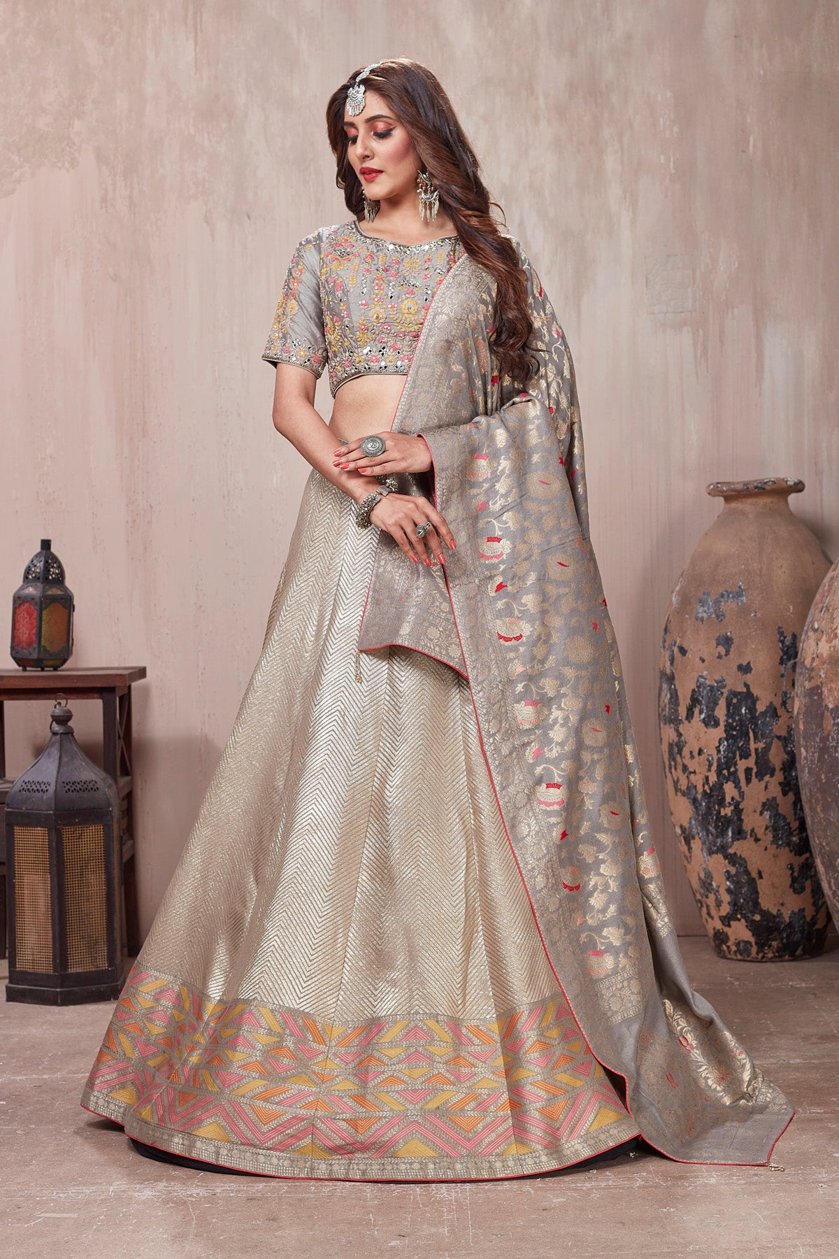 Buy beautiful grey embroidered lehenga online in USA with dupatta. Get set for weddings and festive occasions in exclusive designer Anarkali suits, wedding gown, salwar suits, gharara suits, Indowestern dresses from Pure Elegance Indian fashion store in USA.-front