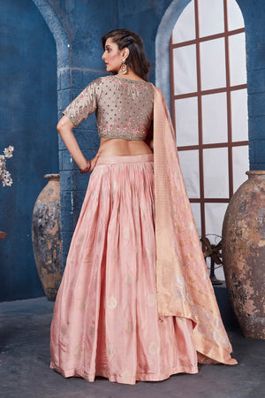 Buy gorgeous peach and beige embroidered designer lehenga online in USA with dupatta. Get set for weddings and festive occasions in exclusive designer Anarkali suits, wedding gown, salwar suits, gharara suits, Indowestern dresses from Pure Elegance Indian fashion store in USA.-back