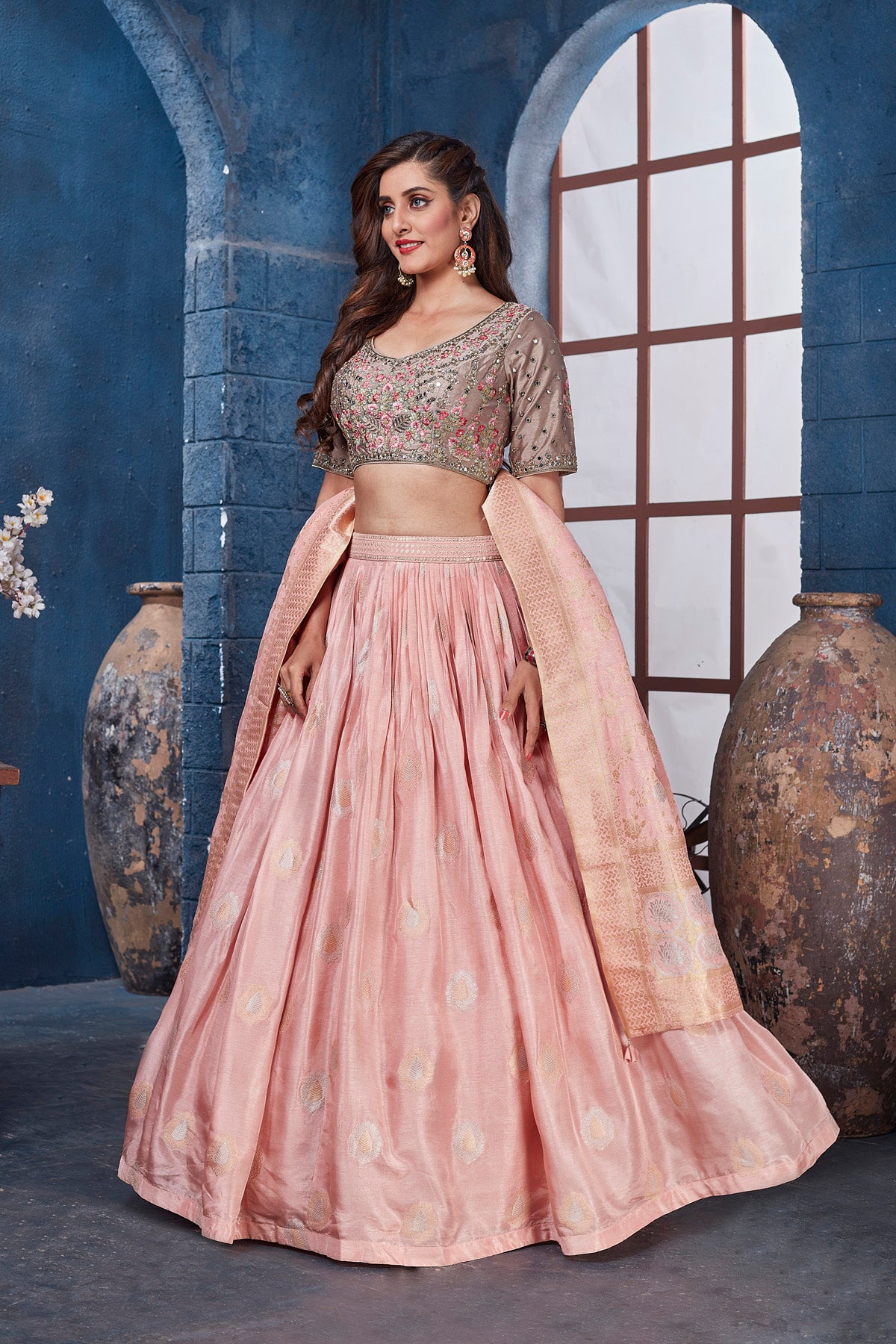 Buy gorgeous peach and beige embroidered designer lehenga online in USA with dupatta. Get set for weddings and festive occasions in exclusive designer Anarkali suits, wedding gown, salwar suits, gharara suits, Indowestern dresses from Pure Elegance Indian fashion store in USA.-left