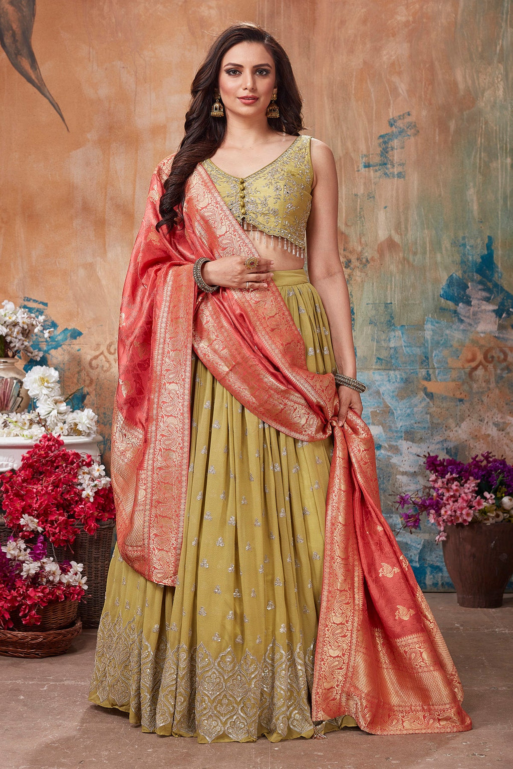 Buy stunning pista green embroidered lehenga online in USA with orange dupatta. Get set for weddings and festive occasions in exclusive designer Anarkali suits, wedding gown, salwar suits, gharara suits, Indowestern dresses from Pure Elegance Indian fashion store in USA.-full view