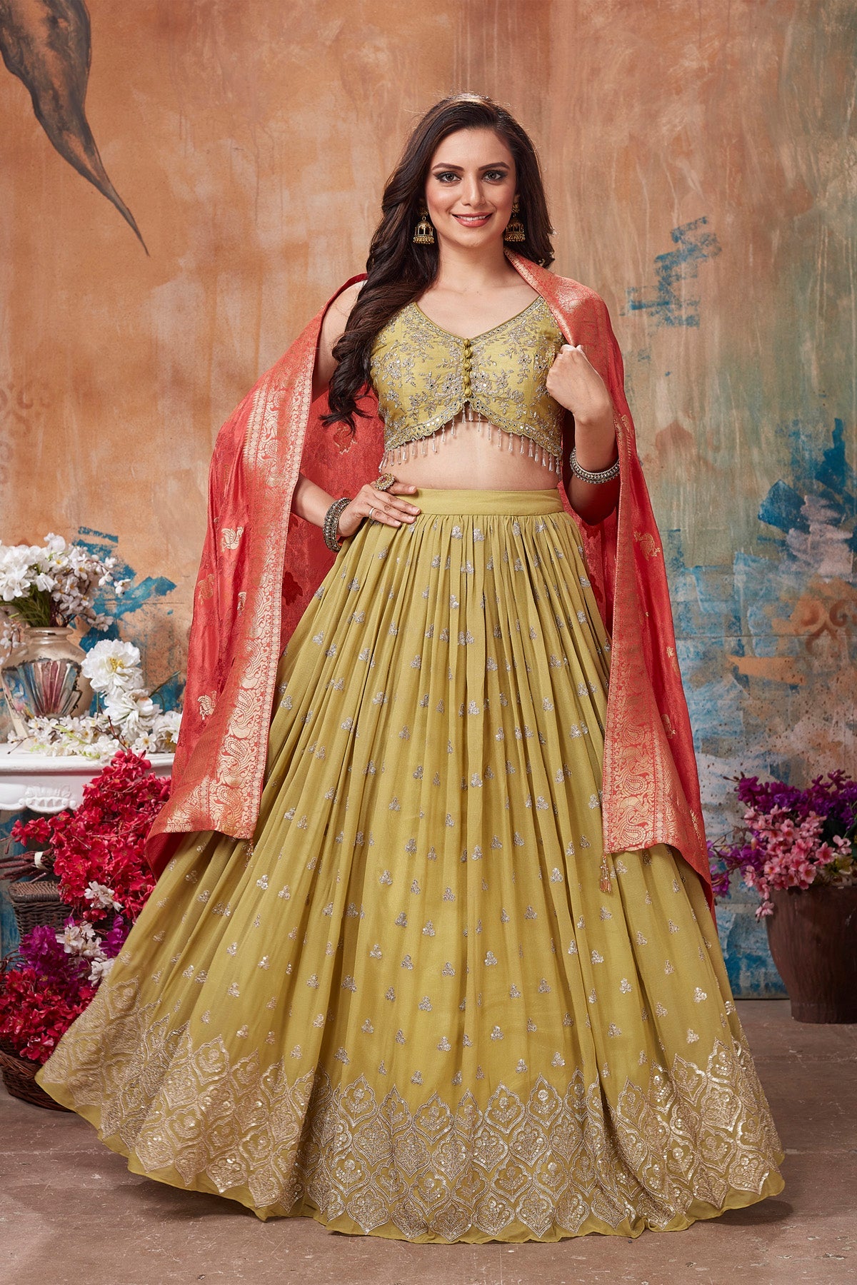 Buy stunning pista green embroidered lehenga online in USA with orange dupatta. Get set for weddings and festive occasions in exclusive designer Anarkali suits, wedding gown, salwar suits, gharara suits, Indowestern dresses from Pure Elegance Indian fashion store in USA.-front
