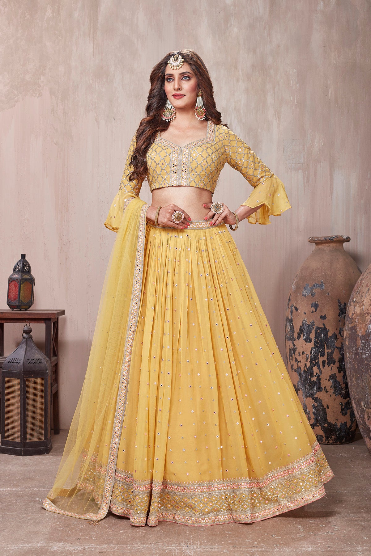 Buy stunning yellow embroidered designer lehenga online in USA with dupatta. Get set for weddings and festive occasions in exclusive designer Anarkali suits, wedding gown, salwar suits, gharara suits, Indowestern dresses from Pure Elegance Indian fashion store in USA.-front