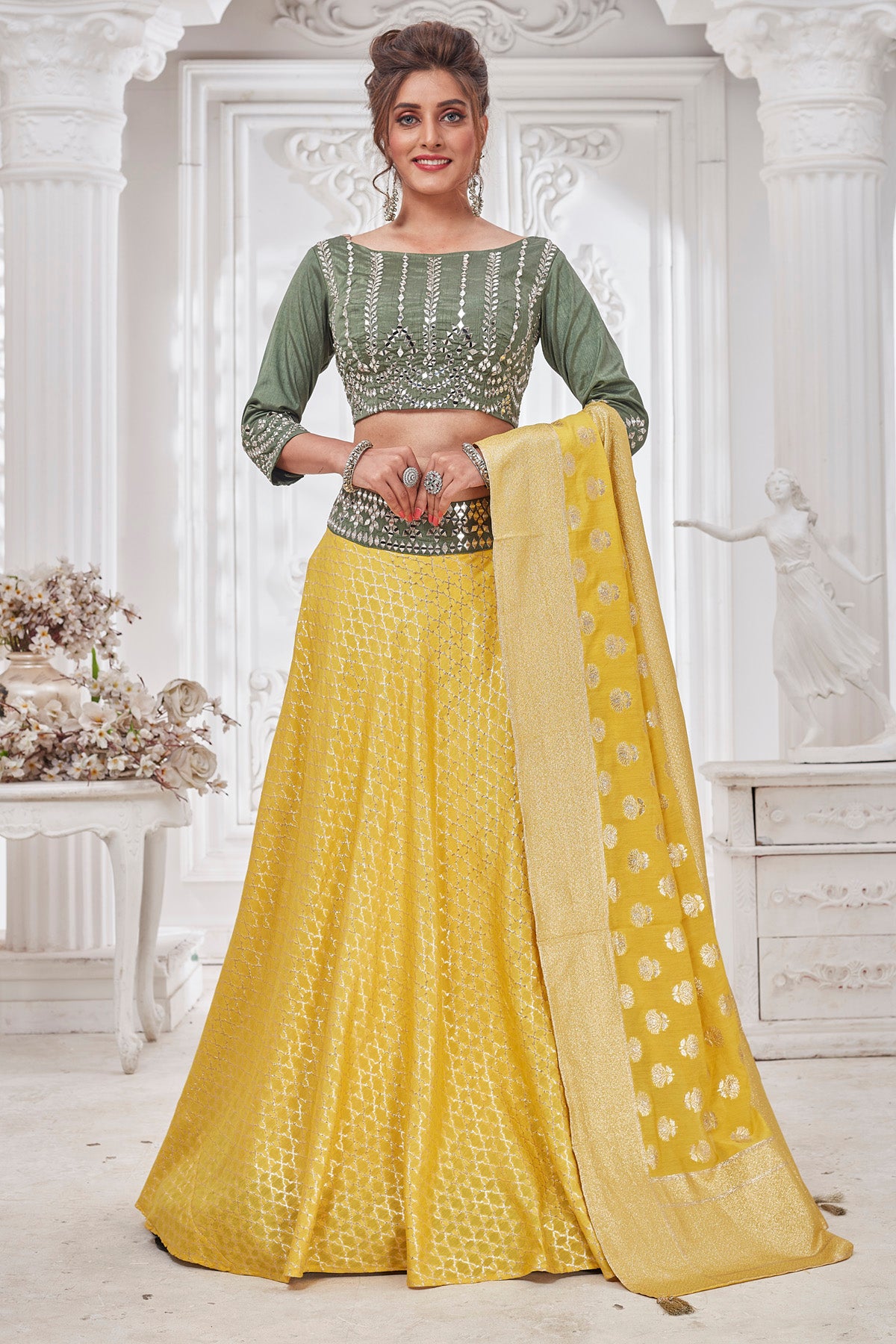 Buy beautiful yellow and green embroidered designer lehenga online in USA with dupatta. Get set for weddings and festive occasions in exclusive designer Anarkali suits, wedding gown, salwar suits, gharara suits, Indowestern dresses from Pure Elegance Indian fashion store in USA.-full view