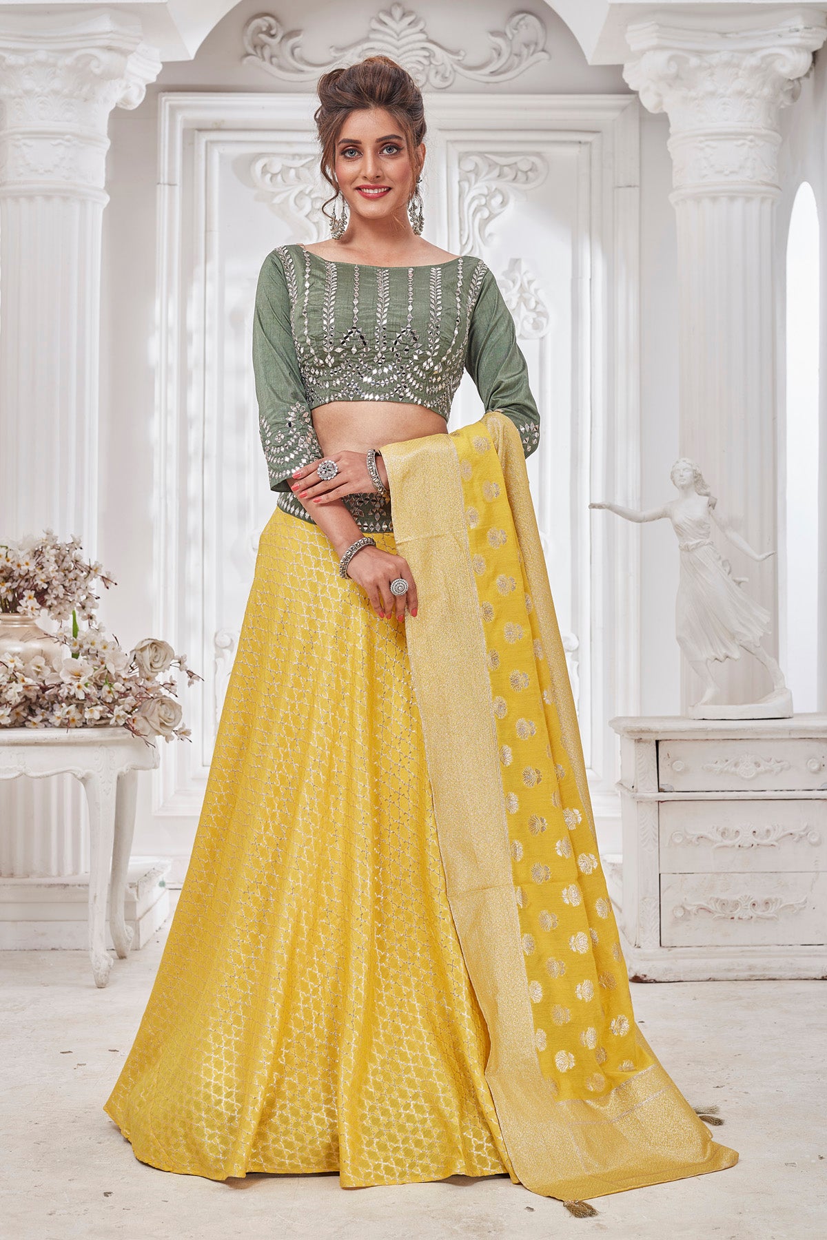 Buy beautiful yellow and green embroidered designer lehenga online in USA with dupatta. Get set for weddings and festive occasions in exclusive designer Anarkali suits, wedding gown, salwar suits, gharara suits, Indowestern dresses from Pure Elegance Indian fashion store in USA.-front