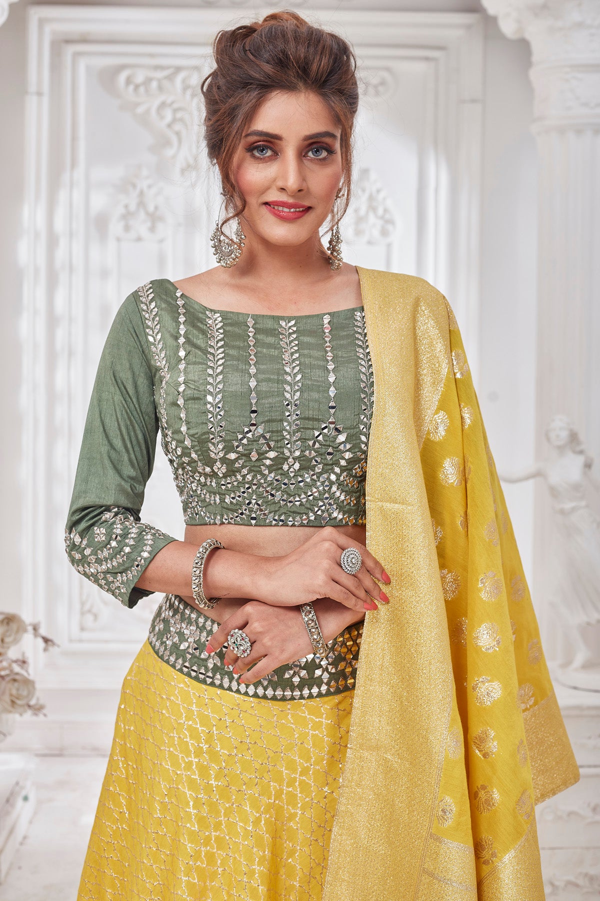 Buy beautiful yellow and green embroidered designer lehenga online in USA with dupatta. Get set for weddings and festive occasions in exclusive designer Anarkali suits, wedding gown, salwar suits, gharara suits, Indowestern dresses from Pure Elegance Indian fashion store in USA.-closeup