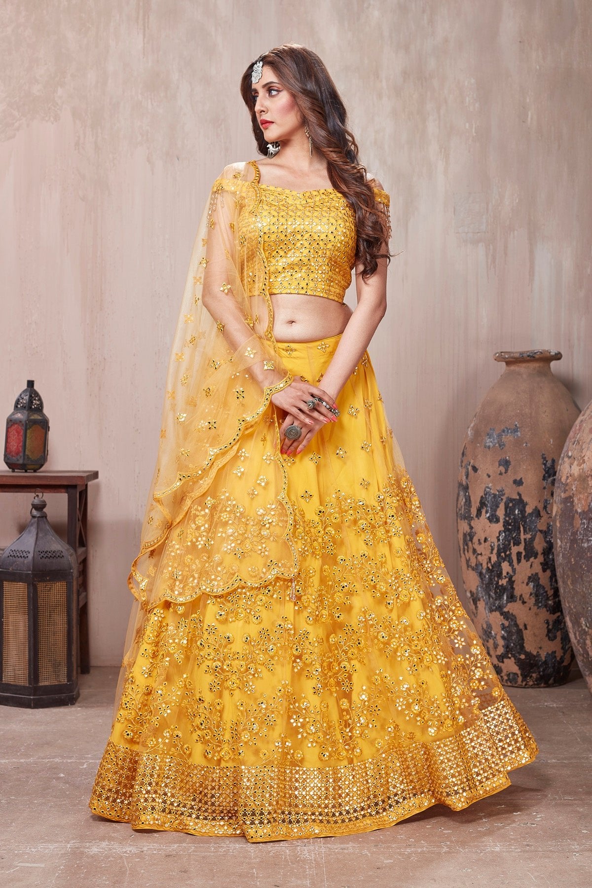 Buy beautiful yellow embroidered designer lehenga online in USA with dupatta. Get set for weddings and festive occasions in exclusive designer Anarkali suits, wedding gown, salwar suits, gharara suits, Indowestern dresses from Pure Elegance Indian fashion store in USA.-front