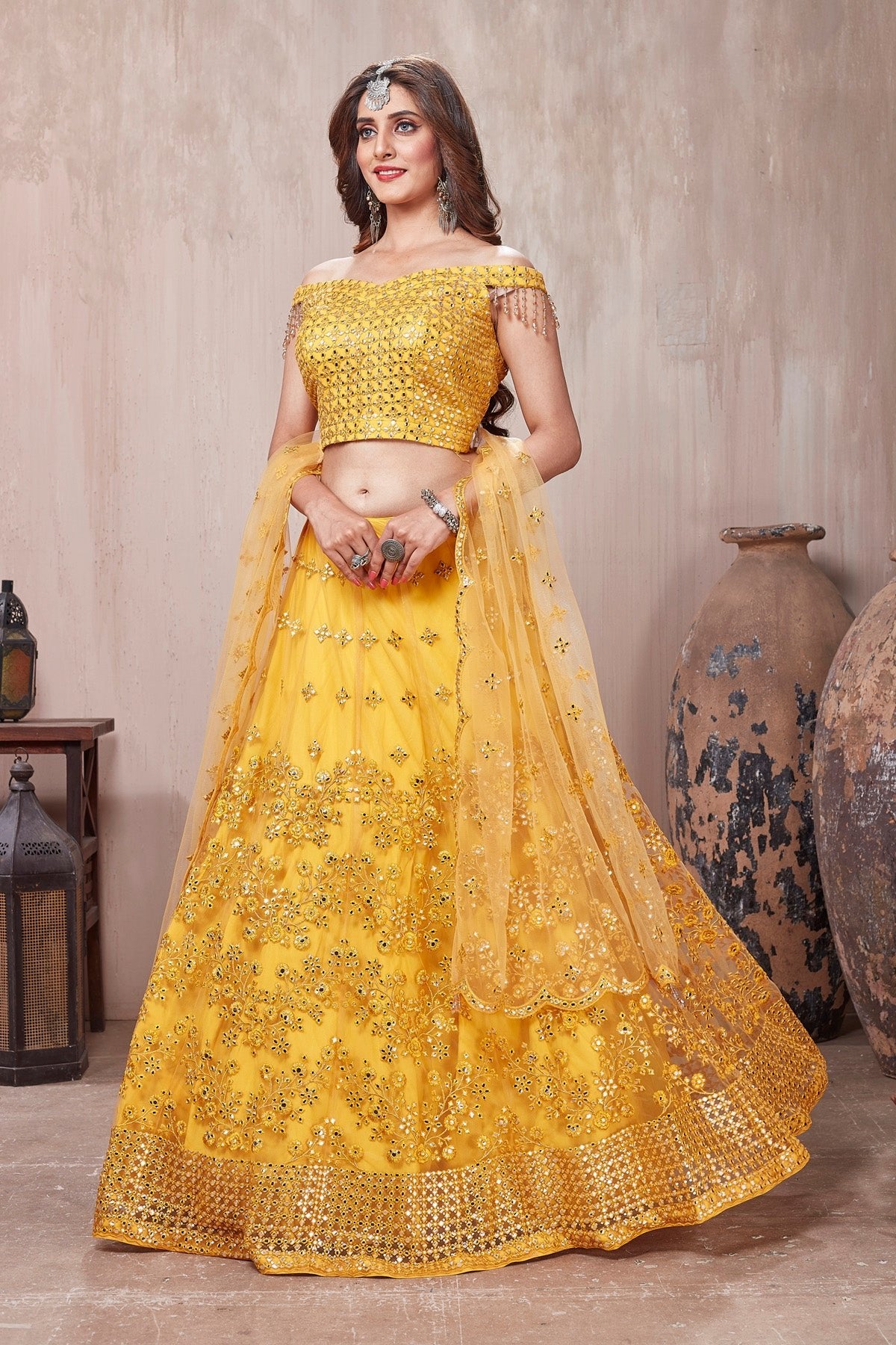Buy beautiful yellow embroidered designer lehenga online in USA with dupatta. Get set for weddings and festive occasions in exclusive designer Anarkali suits, wedding gown, salwar suits, gharara suits, Indowestern dresses from Pure Elegance Indian fashion store in USA.-left