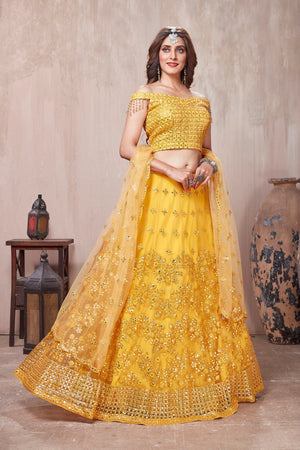 Buy beautiful yellow embroidered designer lehenga online in USA with dupatta. Get set for weddings and festive occasions in exclusive designer Anarkali suits, wedding gown, salwar suits, gharara suits, Indowestern dresses from Pure Elegance Indian fashion store in USA.-right