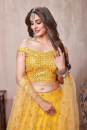 Buy beautiful yellow embroidered designer lehenga online in USA with dupatta. Get set for weddings and festive occasions in exclusive designer Anarkali suits, wedding gown, salwar suits, gharara suits, Indowestern dresses from Pure Elegance Indian fashion store in USA.-closeup