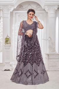 Shop beautiful dark grey embroidered designer net lehenga online in USA with dupatta. Get set for weddings and festive occasions in exclusive designer Anarkali suits, wedding gown, salwar suits, gharara suits, Indowestern dresses from Pure Elegance Indian fashion store in USA.-full view