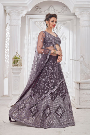 Shop beautiful dark grey embroidered designer net lehenga online in USA with dupatta. Get set for weddings and festive occasions in exclusive designer Anarkali suits, wedding gown, salwar suits, gharara suits, Indowestern dresses from Pure Elegance Indian fashion store in USA.-right