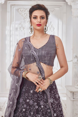Shop beautiful dark grey embroidered designer net lehenga online in USA with dupatta. Get set for weddings and festive occasions in exclusive designer Anarkali suits, wedding gown, salwar suits, gharara suits, Indowestern dresses from Pure Elegance Indian fashion store in USA.-closeup