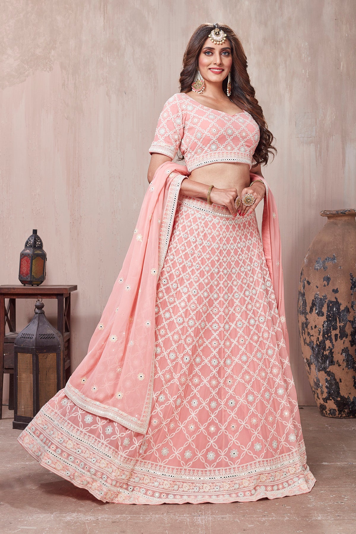 Shop stunning pastel pink embroidered designer lehenga online in USA with dupatta. Get set for weddings and festive occasions in exclusive designer Anarkali suits, wedding gown, salwar suits, gharara suits, Indowestern dresses from Pure Elegance Indian fashion store in USA.-left
