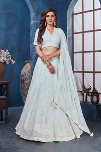 Buy gorgeous powder blue embroidered designer lehenga online in USA with dupatta. Get set for weddings and festive occasions in exclusive designer Anarkali suits, wedding gown, salwar suits, gharara suits, Indowestern dresses from Pure Elegance Indian fashion store in USA.-full view