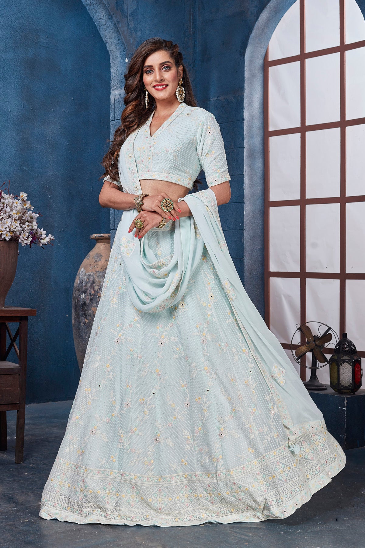 Buy gorgeous powder blue embroidered designer lehenga online in USA with dupatta. Get set for weddings and festive occasions in exclusive designer Anarkali suits, wedding gown, salwar suits, gharara suits, Indowestern dresses from Pure Elegance Indian fashion store in USA.-left