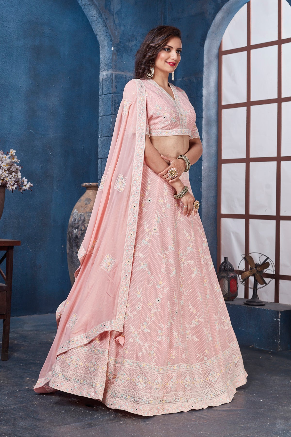 Buy stunning pastel pink embroidered designer lehenga online in USA. Get set for weddings and festive occasions in exclusive designer Anarkali suits, wedding gown, salwar suits, gharara suits, Indowestern dresses from Pure Elegance Indian fashion store in USA.-right