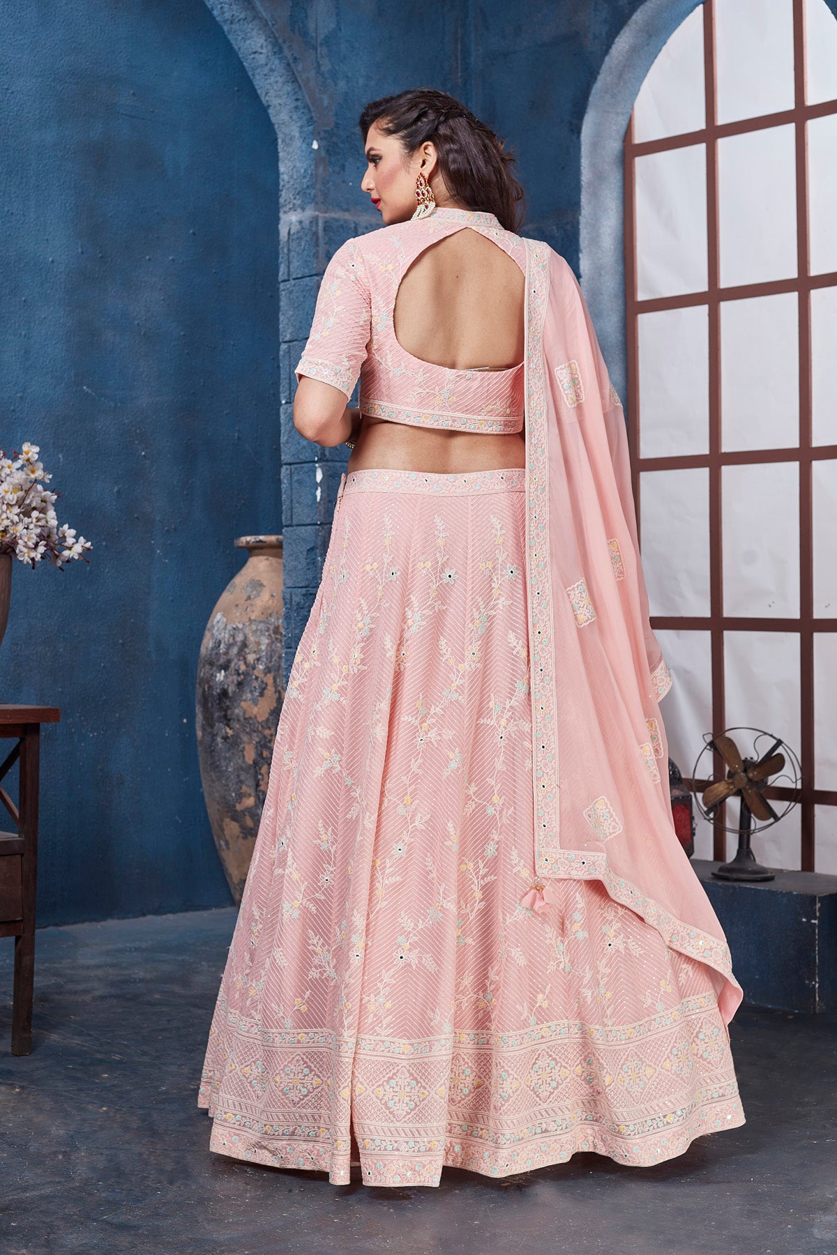Buy stunning pastel pink embroidered designer lehenga online in USA. Get set for weddings and festive occasions in exclusive designer Anarkali suits, wedding gown, salwar suits, gharara suits, Indowestern dresses from Pure Elegance Indian fashion store in USA.-back