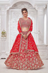 Shop stunning red embroidered bridal lehenga online in USA with dupatta. Get set for weddings and festive occasions in exclusive designer Anarkali suits, wedding gown, salwar suits, gharara suits, Indowestern dresses from Pure Elegance Indian fashion store in USA.-full view