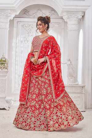 Shop stunning red embroidered bridal lehenga online in USA with dupatta. Get set for weddings and festive occasions in exclusive designer Anarkali suits, wedding gown, salwar suits, gharara suits, Indowestern dresses from Pure Elegance Indian fashion store in USA.-left