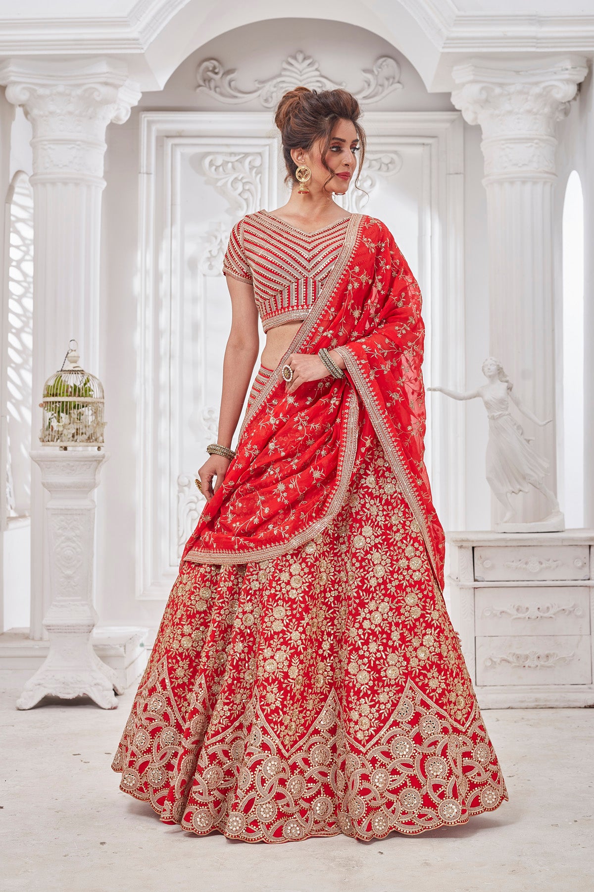 Shop stunning red embroidered bridal lehenga online in USA with dupatta. Get set for weddings and festive occasions in exclusive designer Anarkali suits, wedding gown, salwar suits, gharara suits, Indowestern dresses from Pure Elegance Indian fashion store in USA.-side